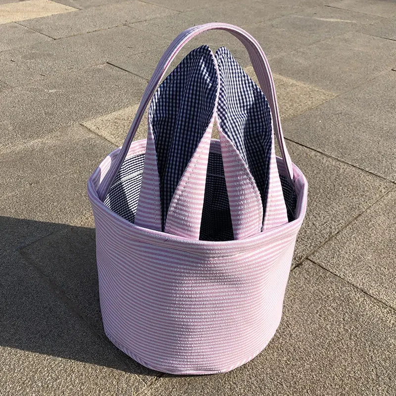 Original representative commercial visual for Wholesale Easter Basket Seersucker Vintage Rabbit Ear Decoration Sublimation Easter Baskets Festival Party Decoration.