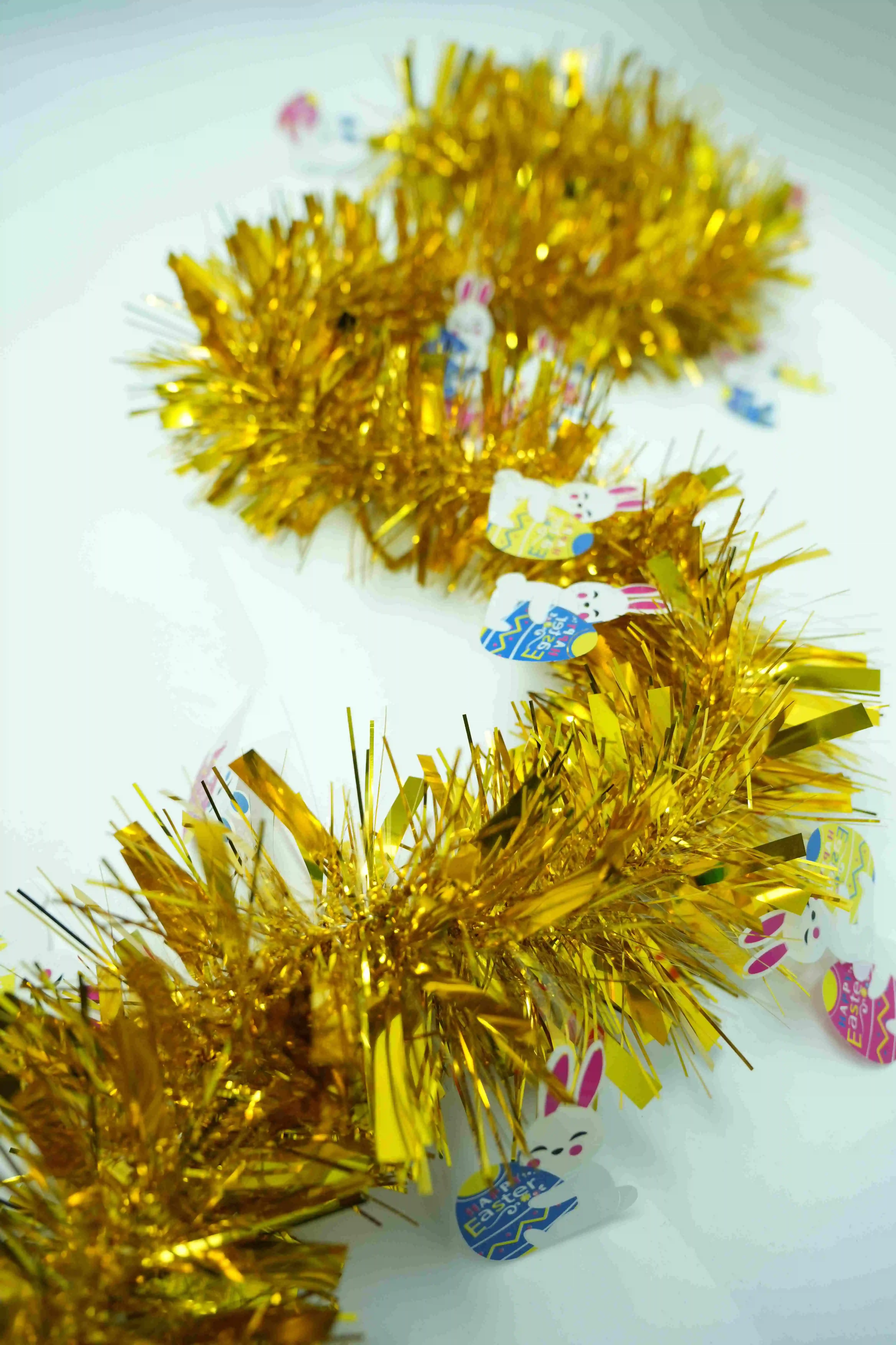 Original representative commercial visual for "Easter Decoration Tinsel with Bunny & Egg - Rabbit and Egg-themed Easter Ribbon Decor".