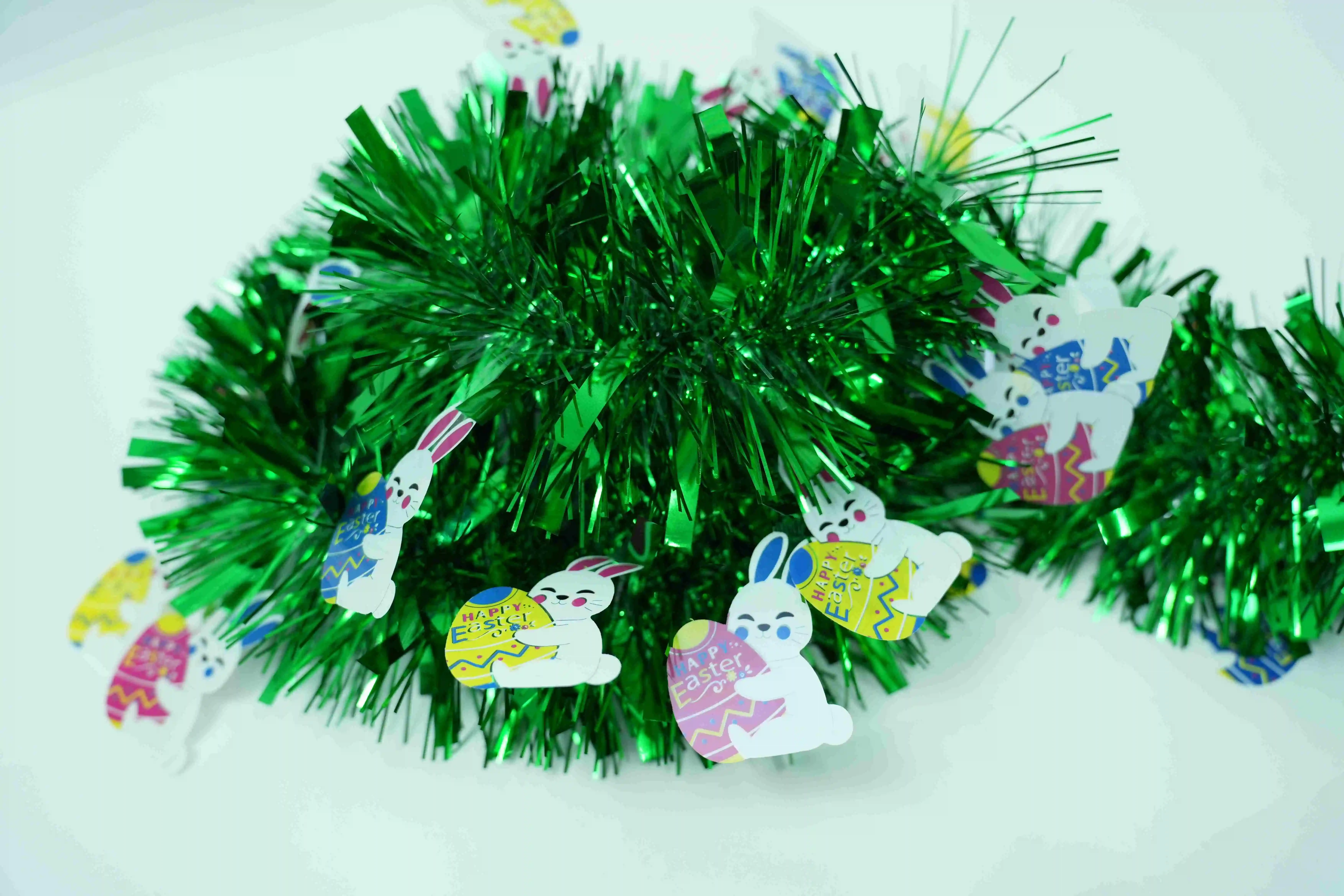 Original representative commercial visual for "Easter Decoration Tinsel with Bunny & Egg - Rabbit and Egg-themed Easter Ribbon Decor".