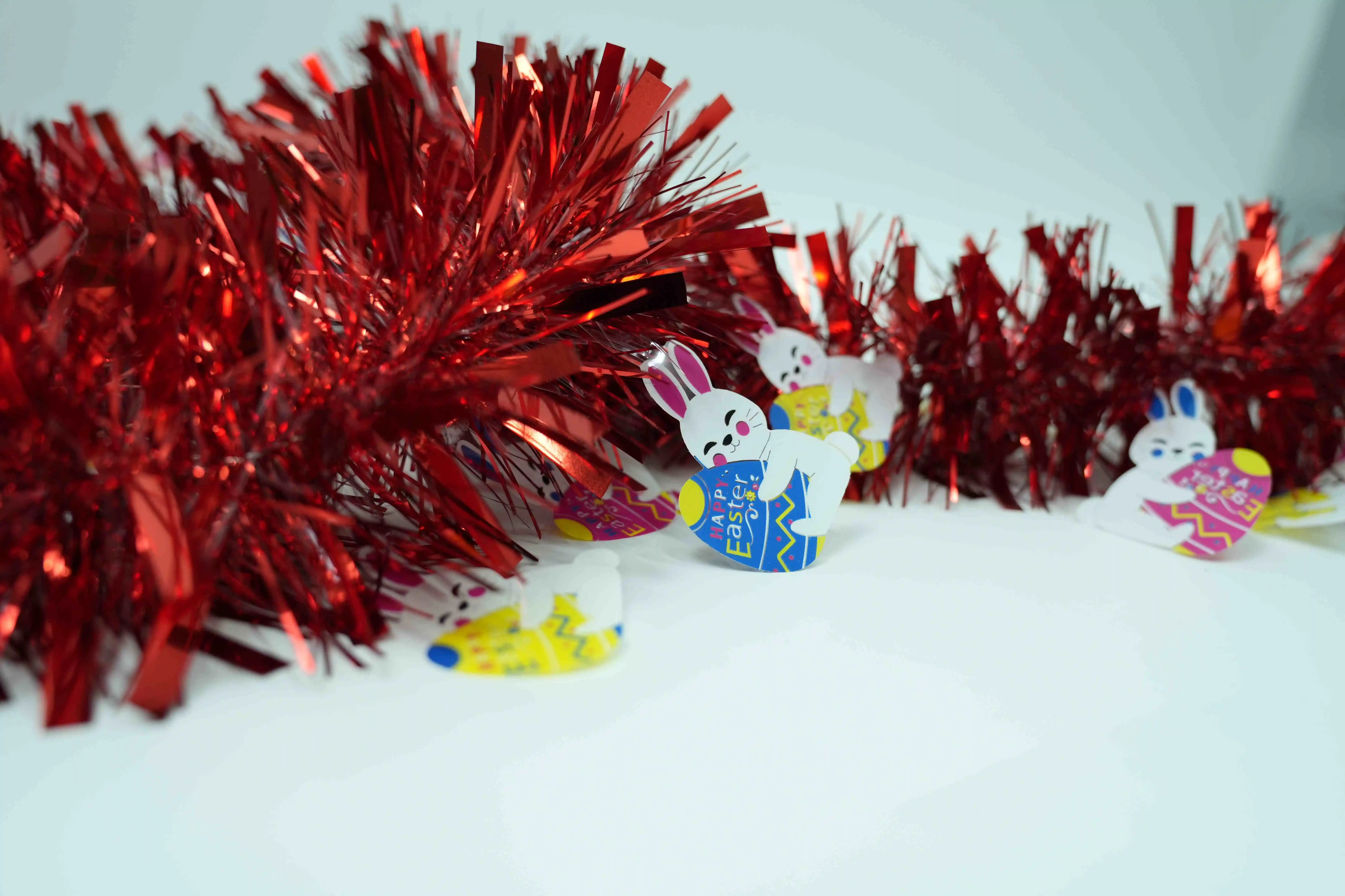 Original representative commercial visual for "Easter Decoration Tinsel with Bunny & Egg - Rabbit and Egg-themed Easter Ribbon Decor".