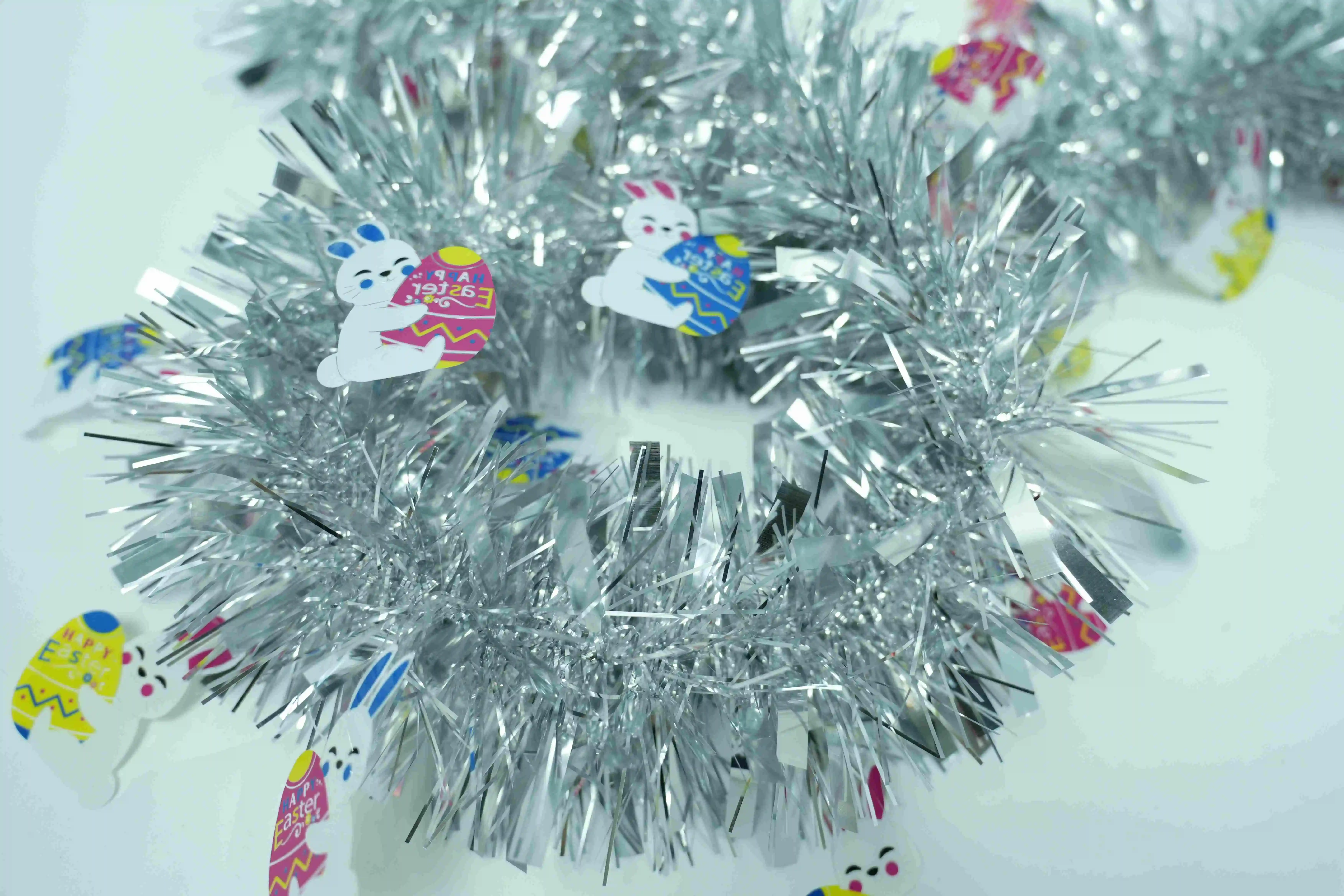 Original representative commercial visual for "Easter Decoration Tinsel with Bunny & Egg - Rabbit and Egg-themed Easter Ribbon Decor".