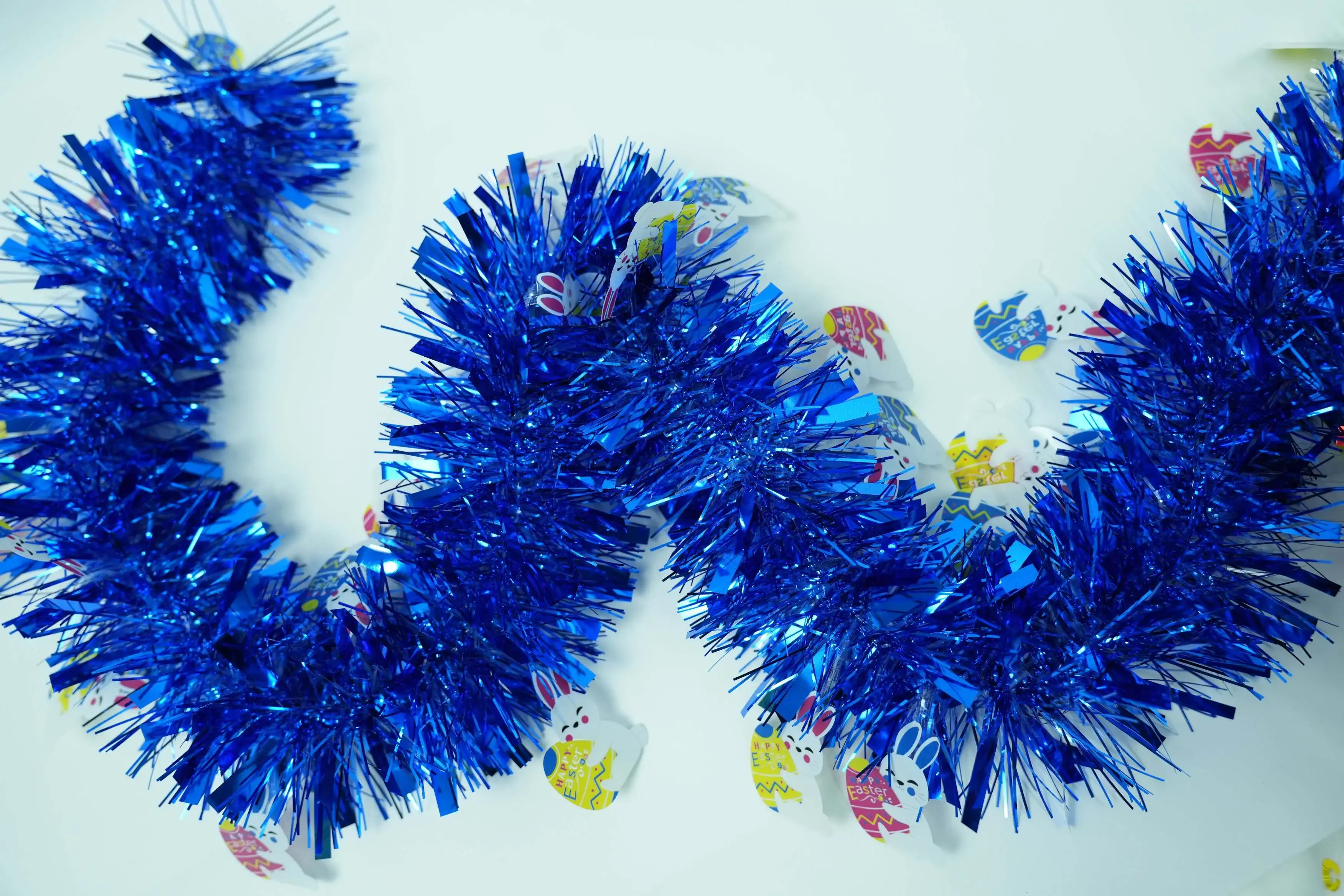 Original representative commercial visual for "Easter Decoration Tinsel with Bunny & Egg - Rabbit and Egg-themed Easter Ribbon Decor".